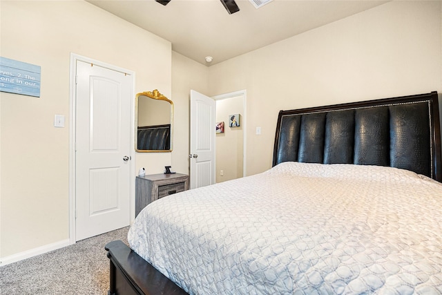 carpeted bedroom with ceiling fan