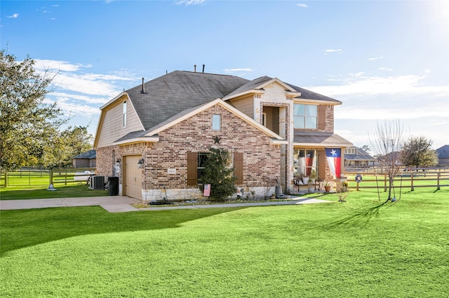 back of house featuring a garage, cooling unit, and a lawn