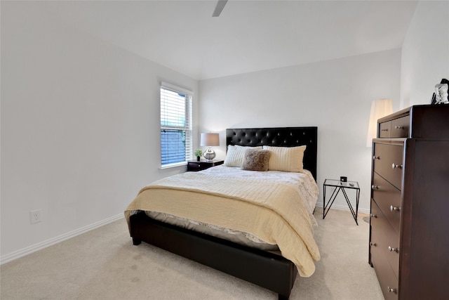 bedroom with light carpet