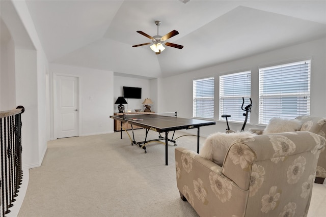 playroom with a raised ceiling, ceiling fan, light carpet, and lofted ceiling