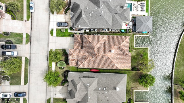 drone / aerial view featuring a water view