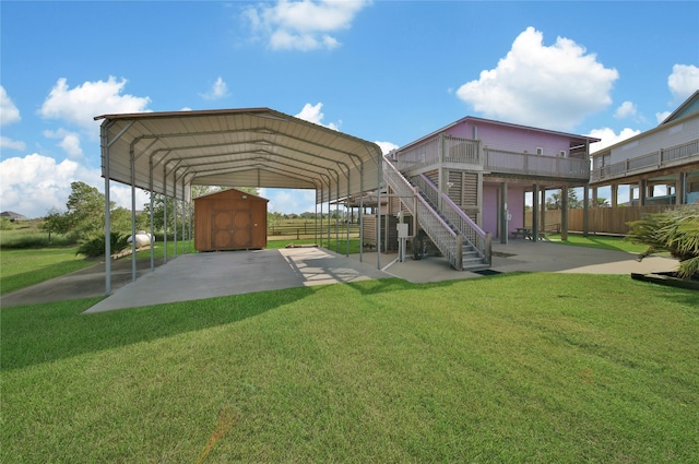 view of jungle gym featuring a yard and a shed