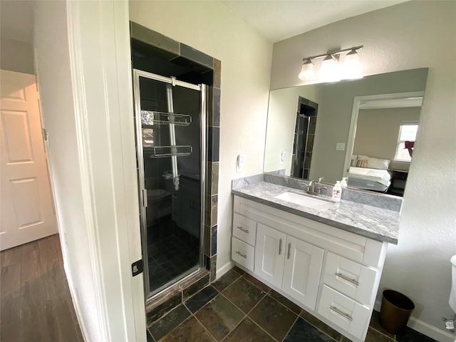 bathroom with vanity and walk in shower