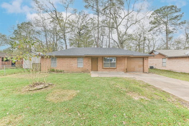 single story home with a garage and a front yard