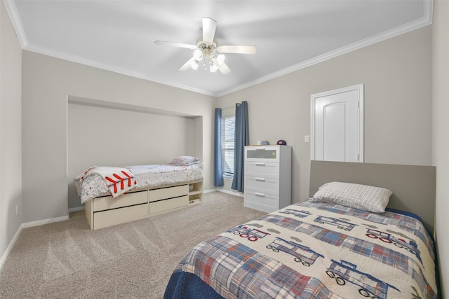 carpeted bedroom featuring ceiling fan and ornamental molding