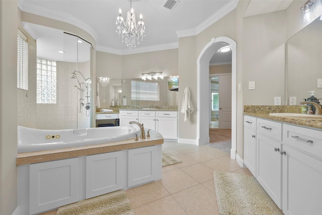 bathroom with tile patterned flooring, vanity, shower with separate bathtub, and ornamental molding