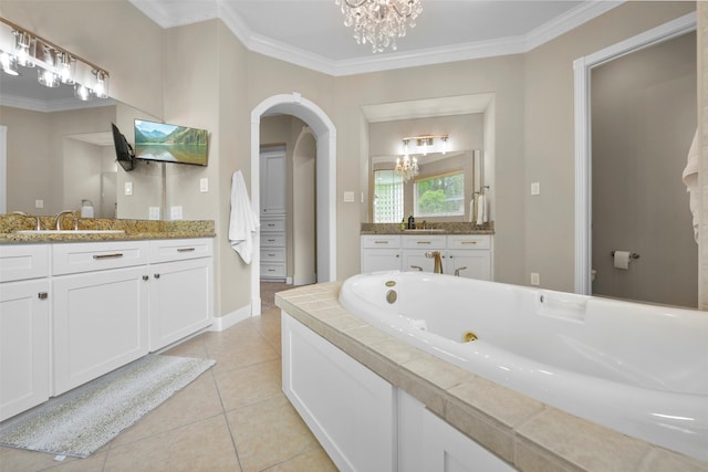 bathroom with tile patterned flooring, vanity, a chandelier, and ornamental molding