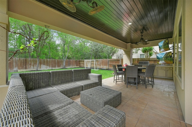 view of patio / terrace featuring an outdoor living space and ceiling fan