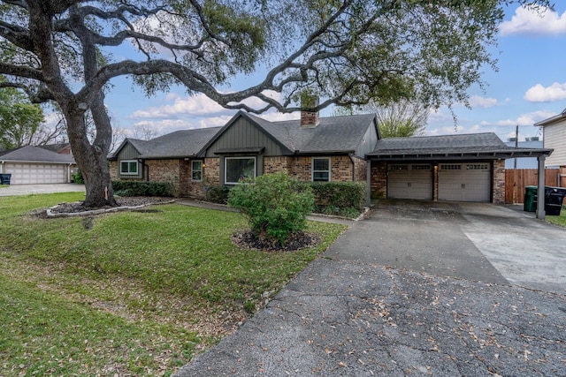 ranch-style home with a front lawn and a garage