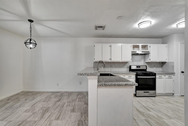 kitchen featuring stainless steel range, sink, kitchen peninsula, decorative light fixtures, and white cabinets