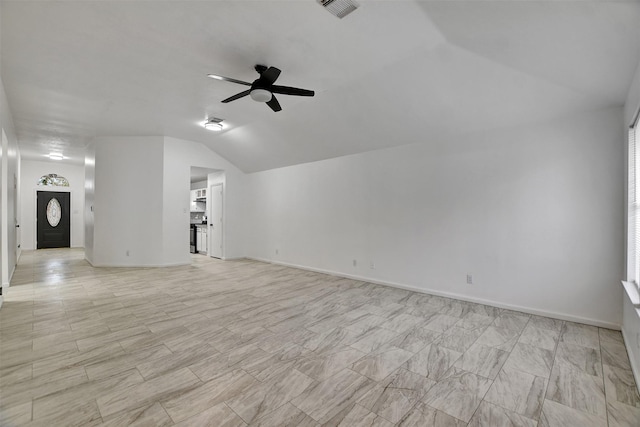 unfurnished living room featuring ceiling fan and lofted ceiling