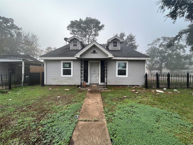 view of front facade with a front yard