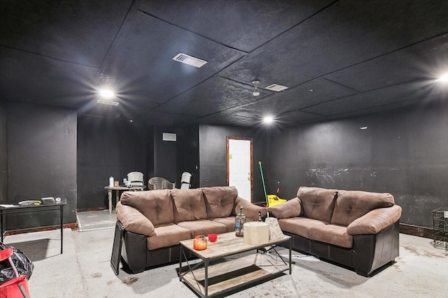 living room with concrete flooring