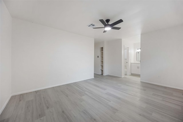 unfurnished room with light hardwood / wood-style floors and ceiling fan