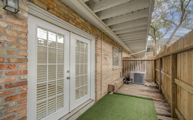 exterior space featuring french doors and central air condition unit