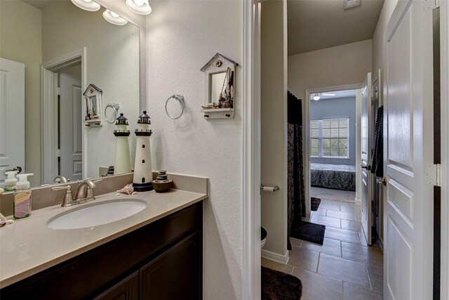 bathroom featuring tile patterned floors and vanity