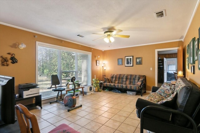 living room with ceiling fan, light tile patterned floors, and crown molding