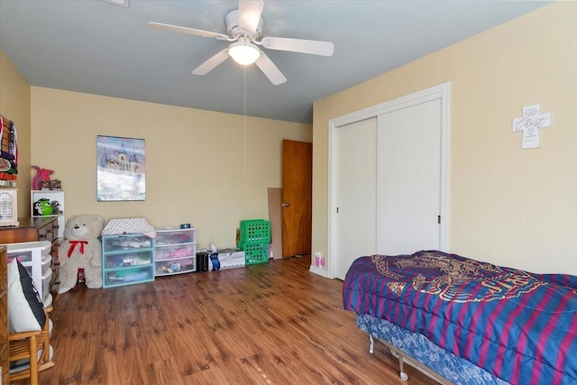 bedroom with a closet, ceiling fan, and hardwood / wood-style floors