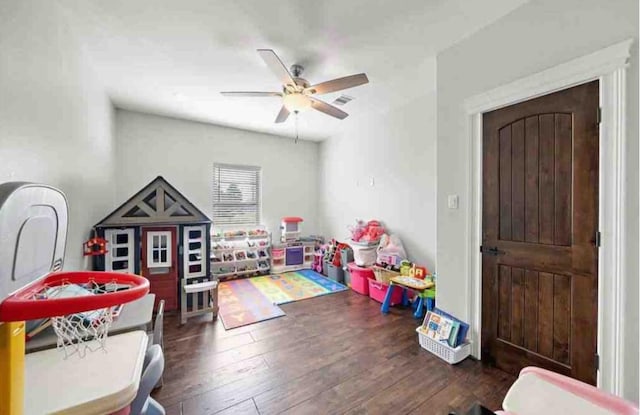 recreation room featuring ceiling fan and dark wood-type flooring