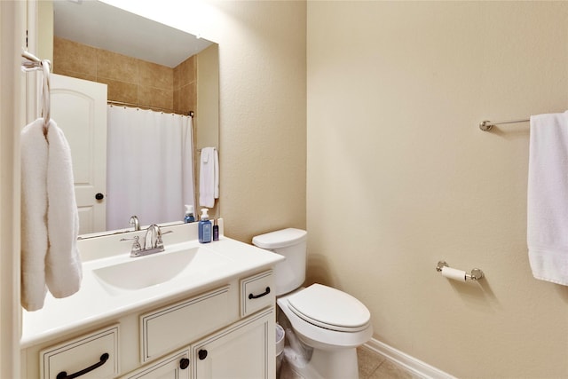 bathroom featuring tile patterned flooring, a shower with curtain, vanity, and toilet