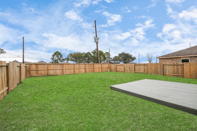 view of yard featuring a deck