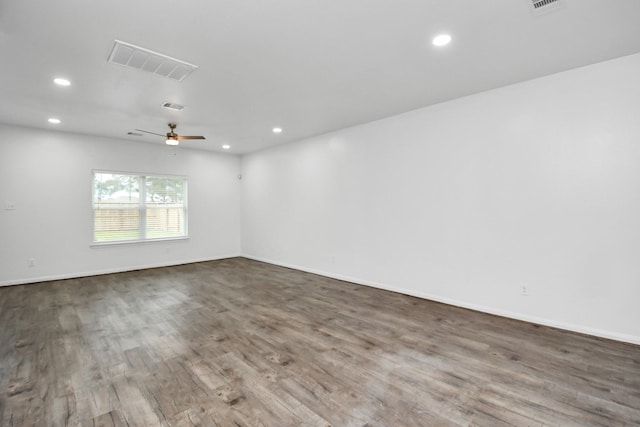 unfurnished room with wood-type flooring and ceiling fan