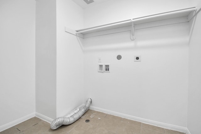 laundry area with hookup for an electric dryer, light tile patterned flooring, gas dryer hookup, and hookup for a washing machine