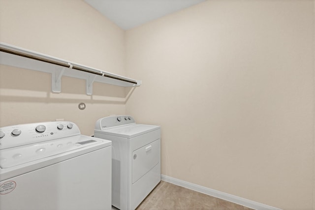 washroom featuring independent washer and dryer