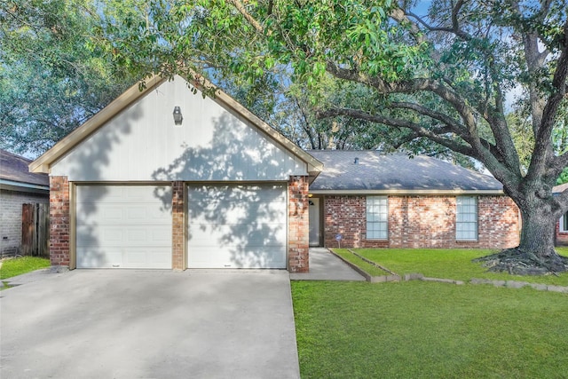 ranch-style home with a garage and a front lawn