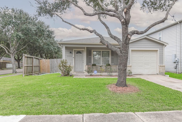 ranch-style house with a garage and a front lawn