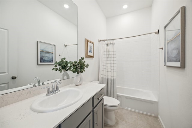 full bathroom with tile patterned floors, shower / tub combo with curtain, vanity, and toilet