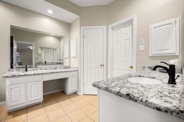 bathroom with vanity and tile patterned flooring