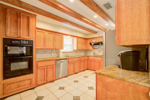 kitchen with sink, appliances with stainless steel finishes, light stone counters, tasteful backsplash, and beamed ceiling