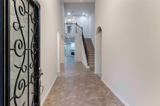 hallway with a towering ceiling