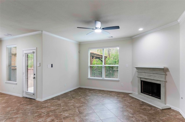 unfurnished living room with ceiling fan and crown molding