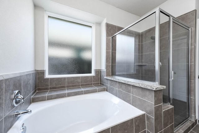 bathroom with independent shower and bath