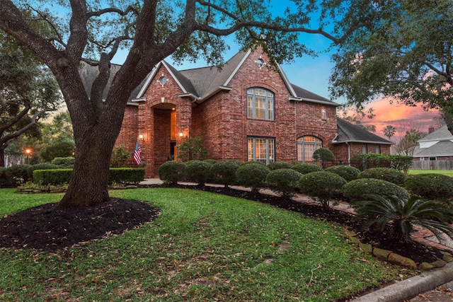 16403 Agusta Ct, Spring, TX 77379 - view of front of home featuring a shingled roof, a front lawn, and brick siding