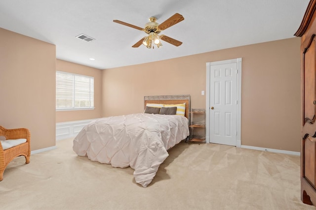 carpeted bedroom with ceiling fan