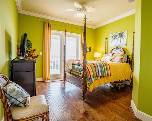 bedroom featuring ceiling fan, ornamental molding, access to outside, and multiple windows