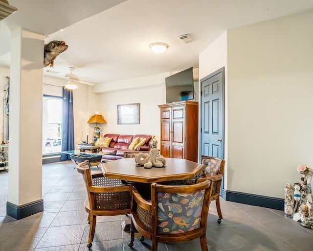 dining space featuring ceiling fan