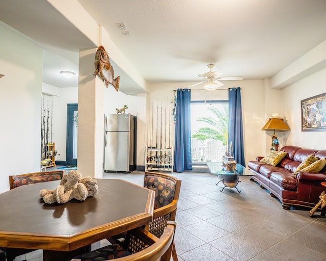 dining space with ceiling fan