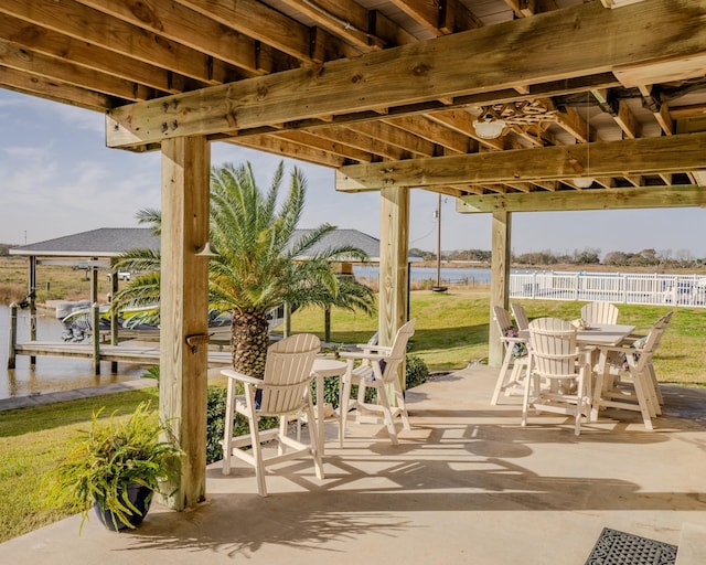 view of patio with a water view