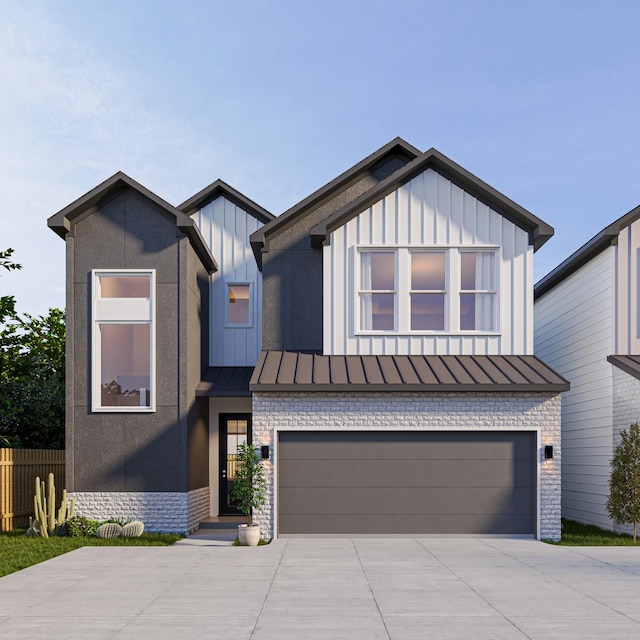 modern farmhouse style home featuring a standing seam roof, concrete driveway, an attached garage, and board and batten siding