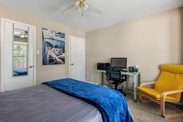 carpeted bedroom featuring ceiling fan