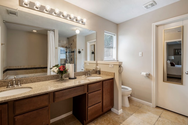 full bathroom with vanity, separate shower and tub, and toilet