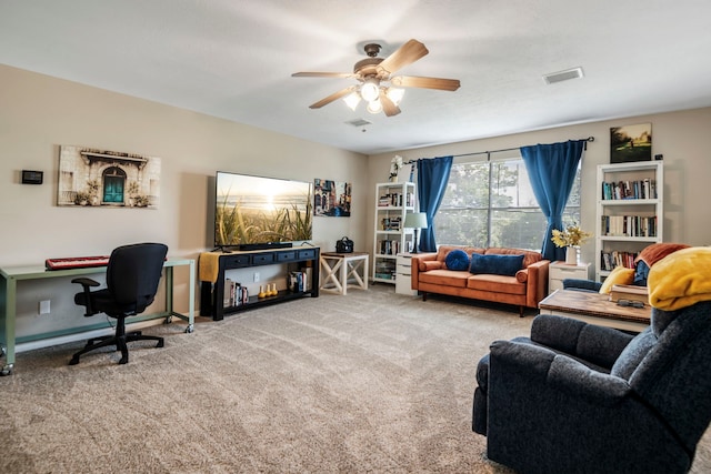 living room featuring carpet flooring and ceiling fan