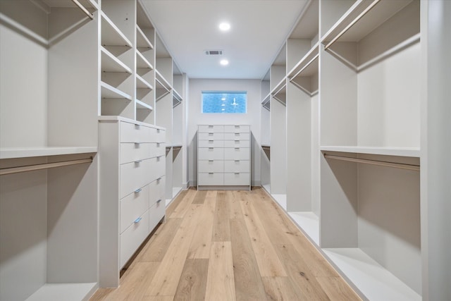 walk in closet featuring light wood-type flooring