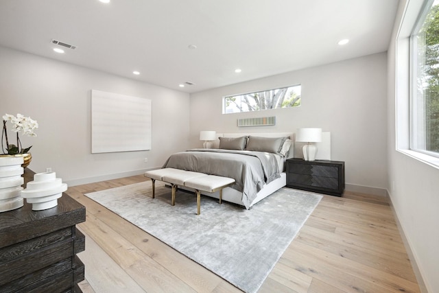 bedroom featuring light wood-type flooring