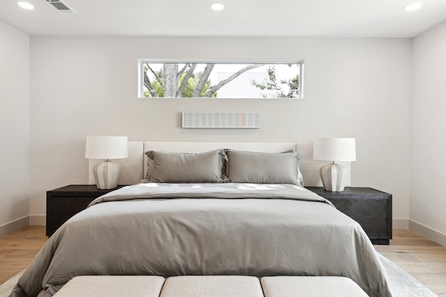 bedroom featuring light hardwood / wood-style flooring