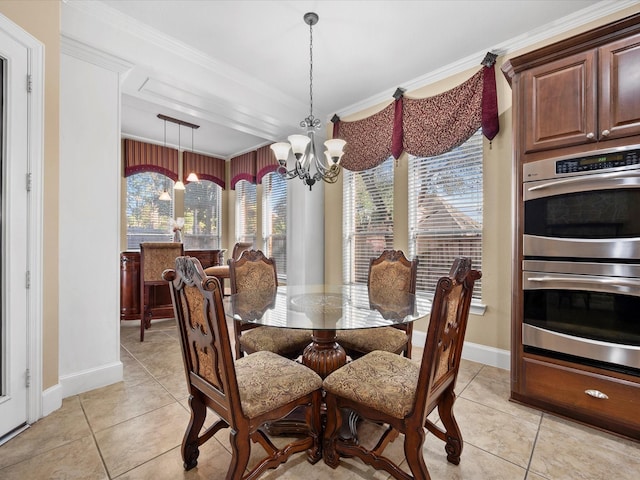 dining space featuring an inviting chandelier, light tile patterned flooring, and ornamental molding